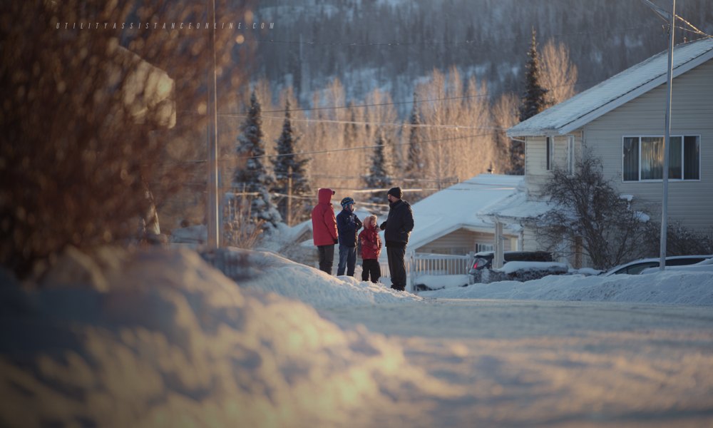 Alaskan family enjoying a walk through their neighborhood